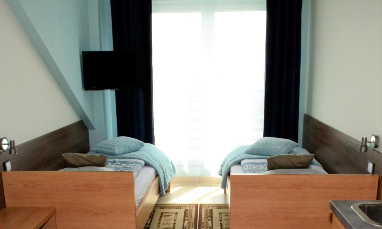 Comfort-24 Plus Słupca Buitenkant foto